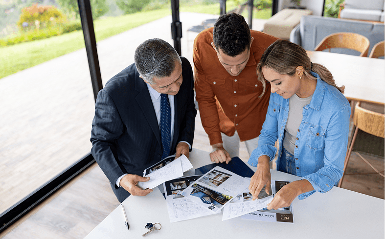 Group reviewing documents at a table